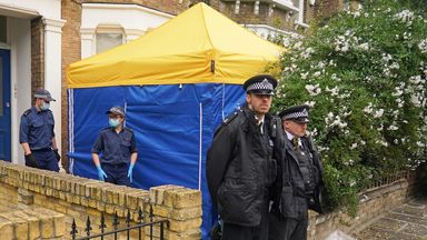 Police officers investigating the killing of Sir David Amess erect a tent outside a house in north London